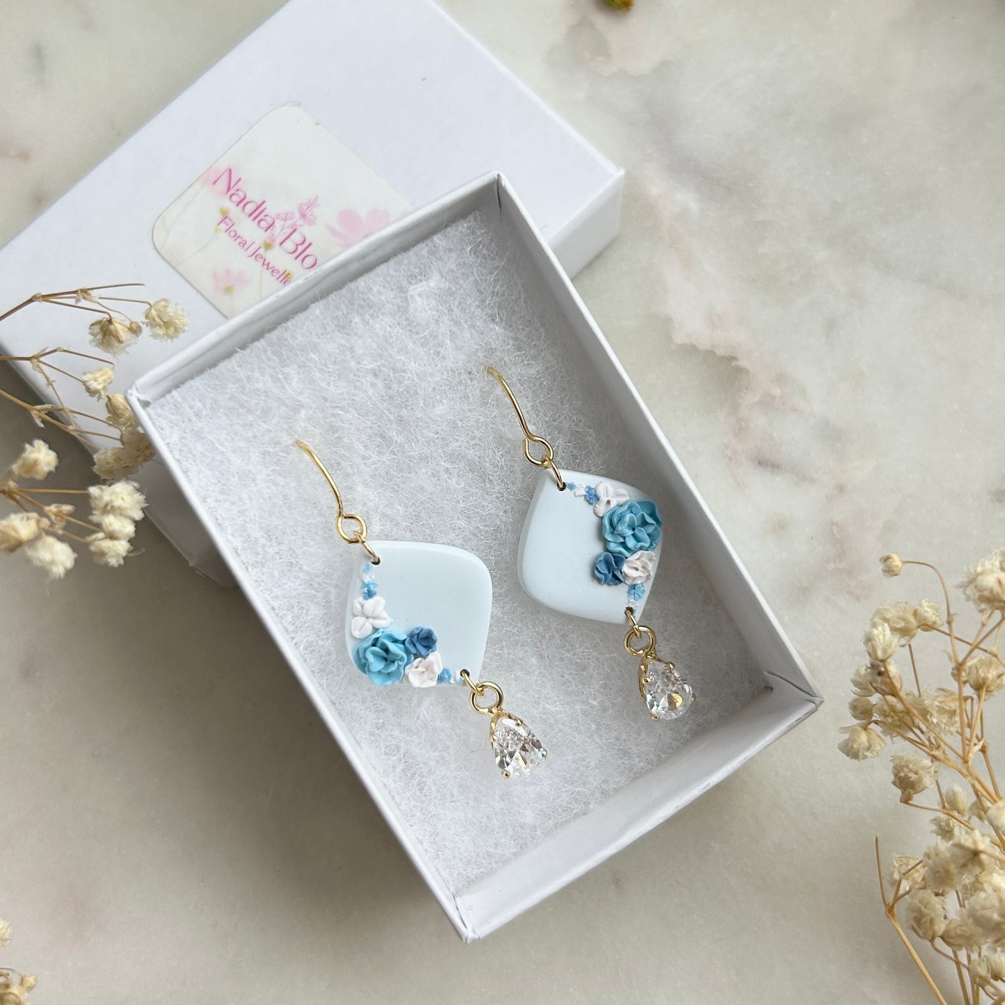 Blue and purple earring with zirconia stone