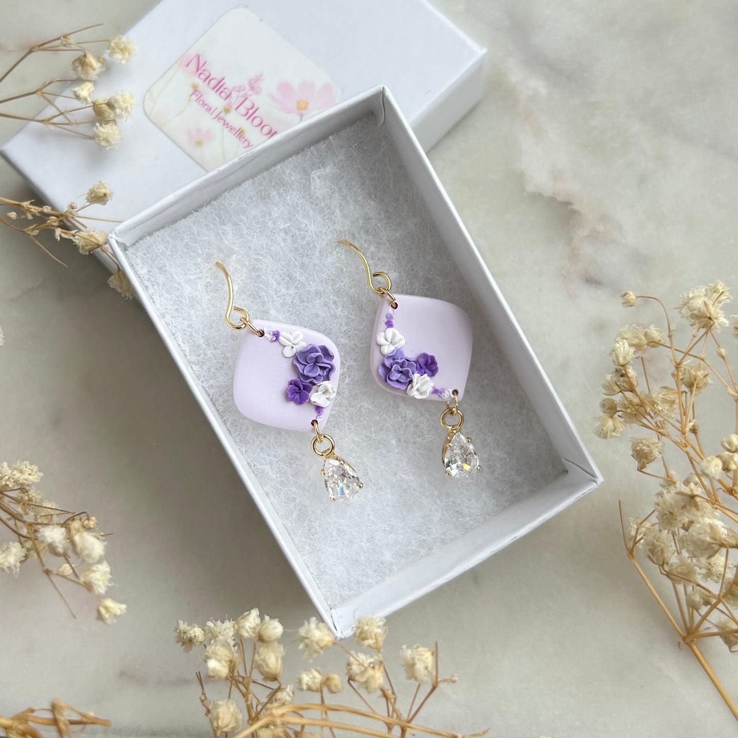 Blue and purple earring with zirconia stone