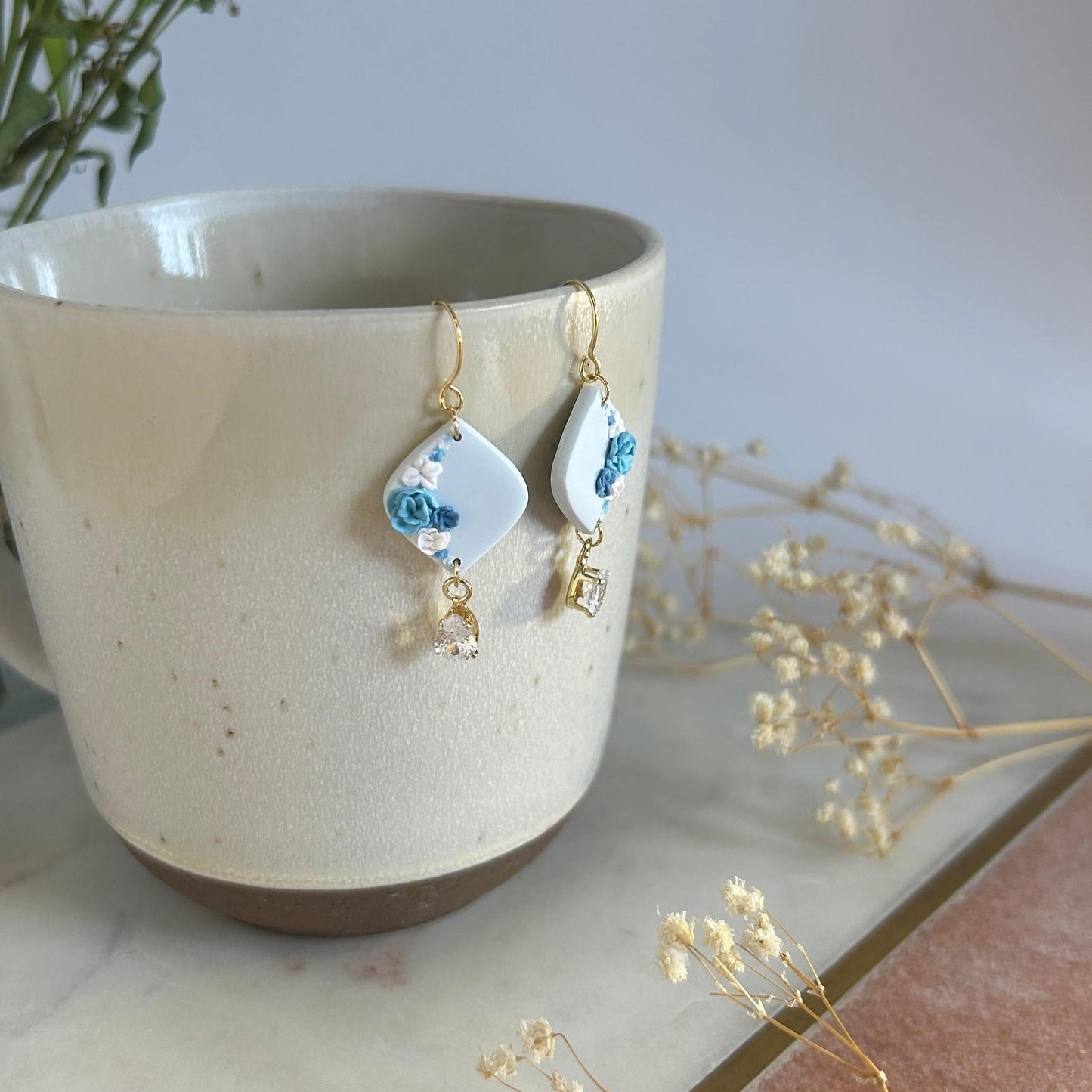 Blue and purple earring with zirconia stone