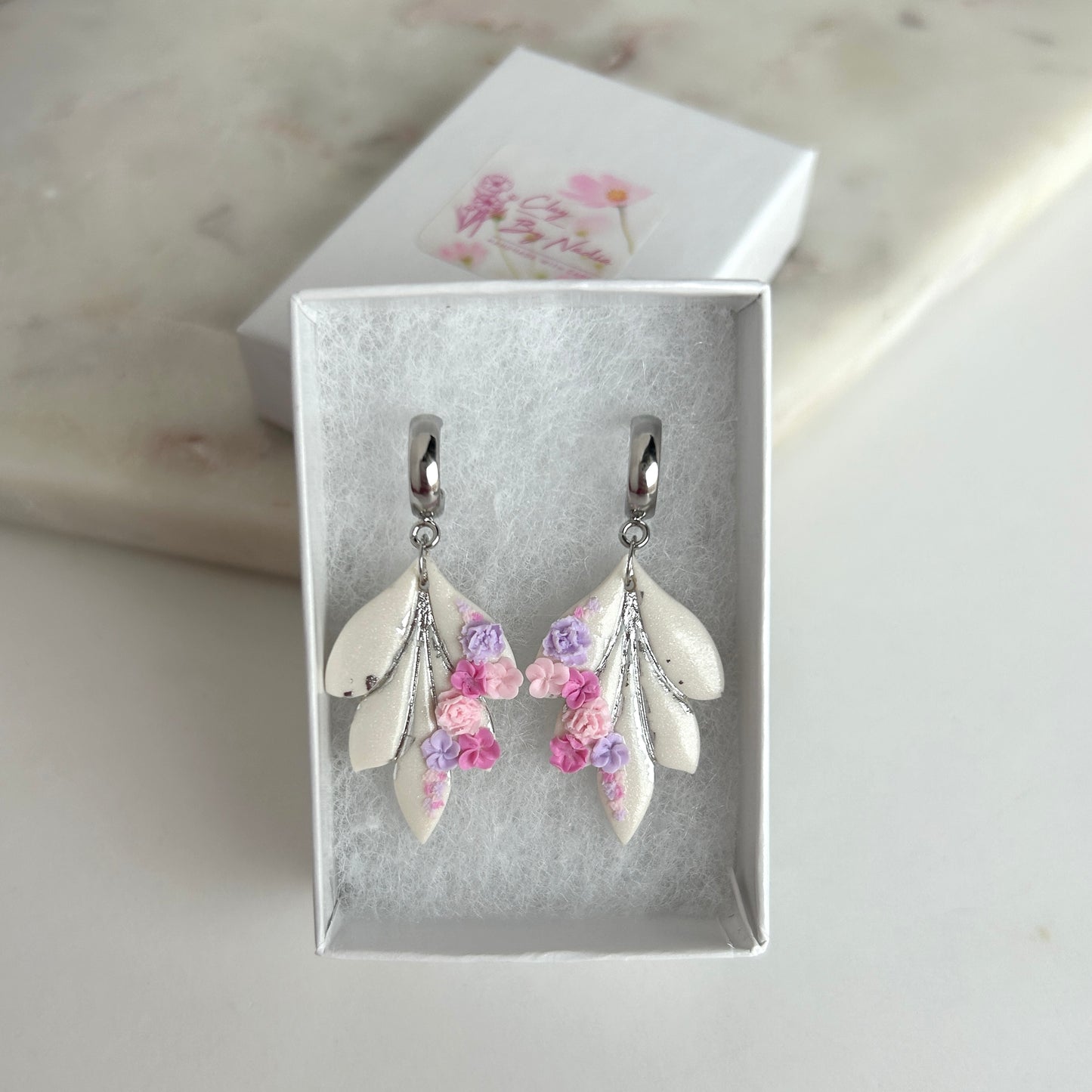 Floral pastel earrings with huggie post