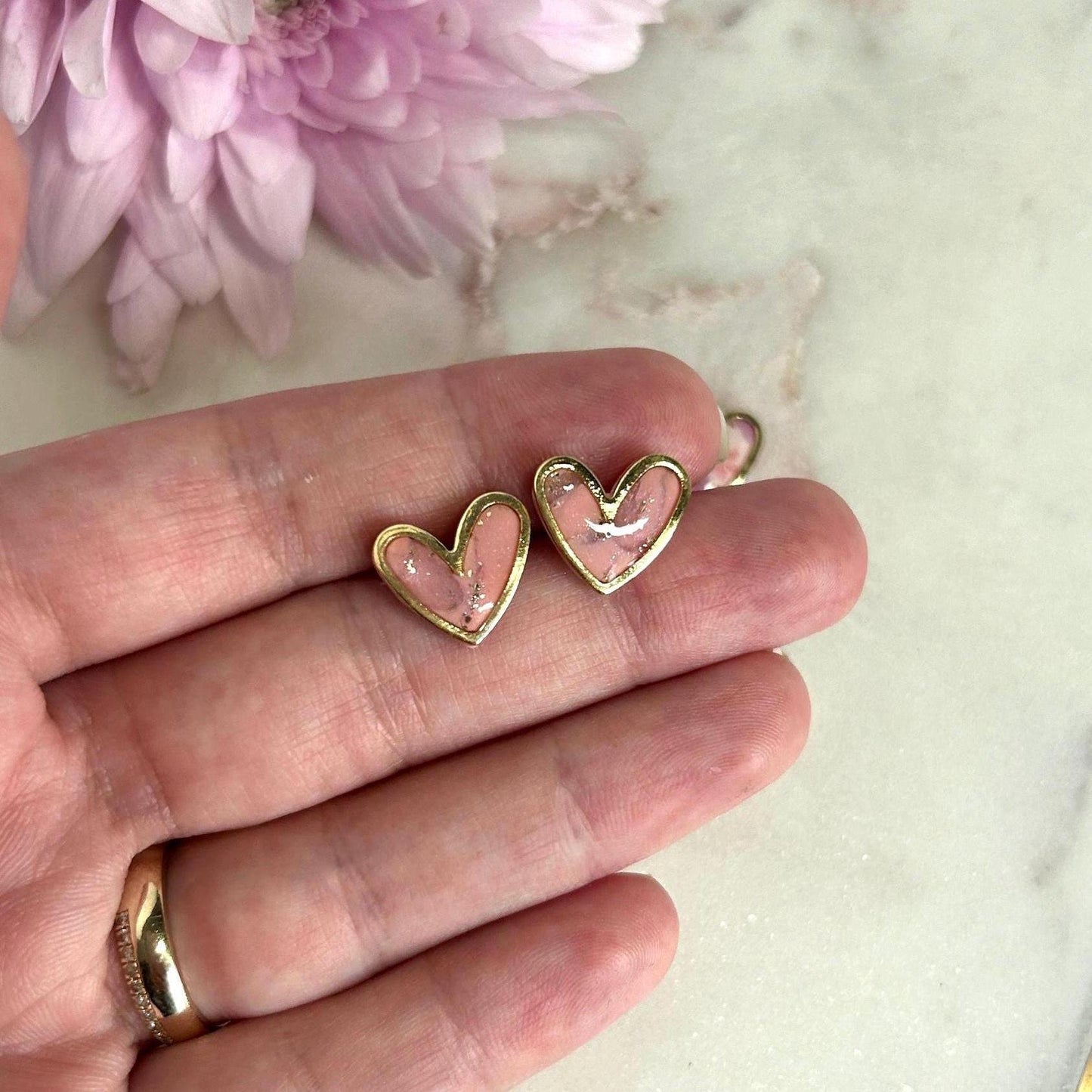 Gold framed heart marble studs