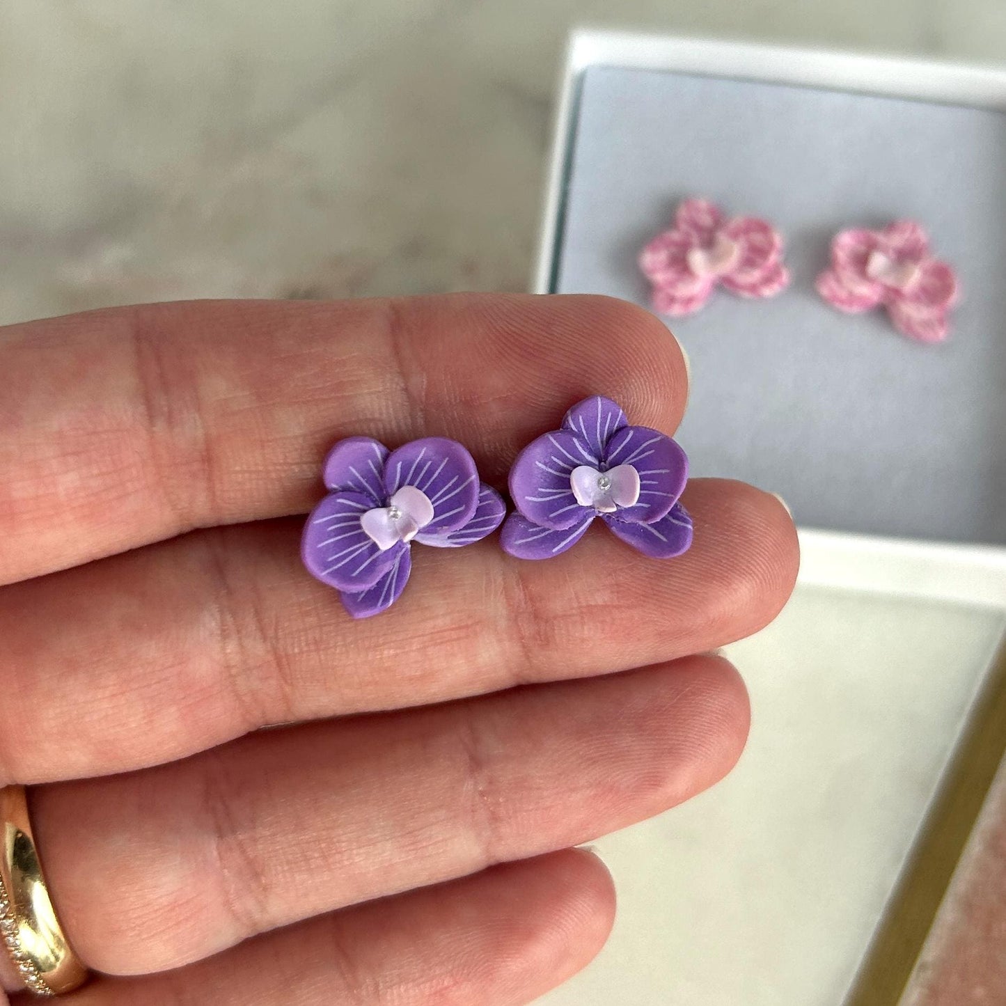 Orchid studs in purple