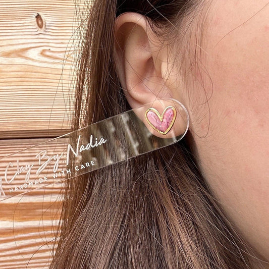 Gold framed heart marble studs