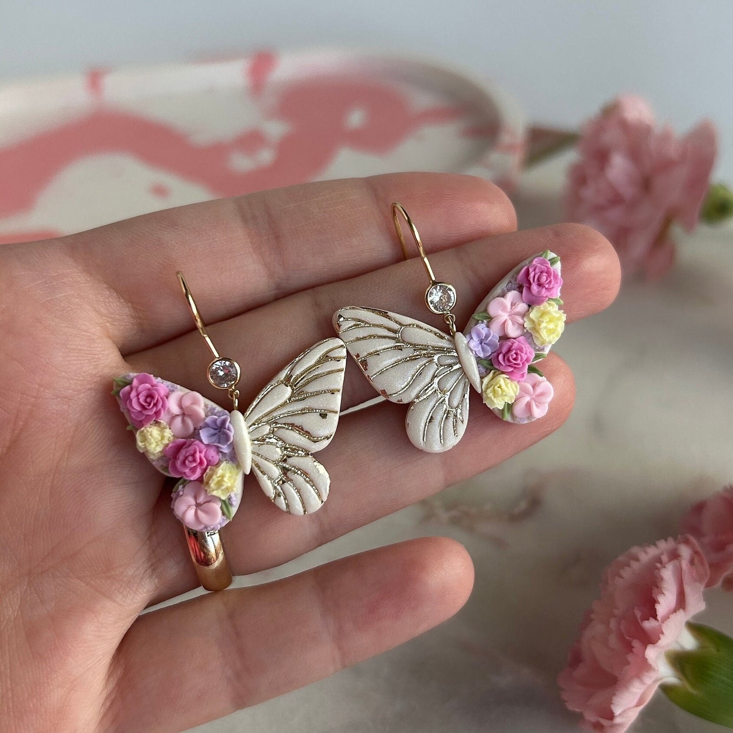 Floral butterfly dangle earrings