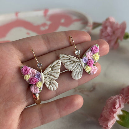 Floral butterfly dangle earrings